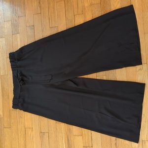 Cropped black gazpacho pants with slit in bottom of pant leg and tie from Timing